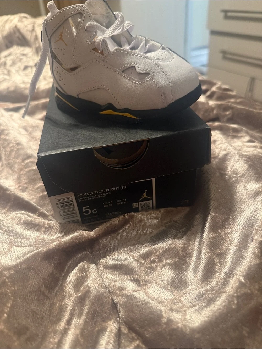 Jordan White and Black Toddlers' High-Top Sneakers with Yellow Details